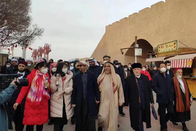 Muslim scholars, clerics visit Xinjiang; Uyghurs living abroad object