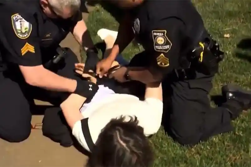 Watch: Emory University Professor protesting against Israel knocked down, handcuffed